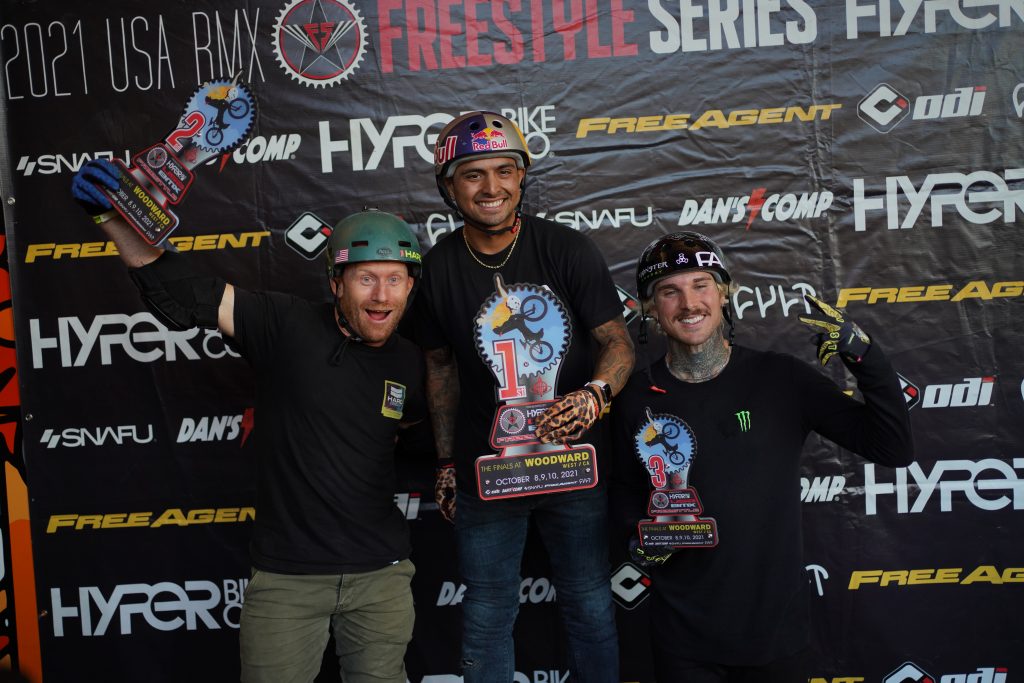 Free Agent riders Daniel Sandoval and Jeremy Malott on the pro podium standing first and third at the 2021 USA BMX National Freestyle finals.